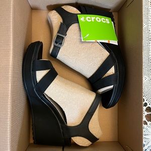 Brand new, Crocs, black, wedge heels, size 9.